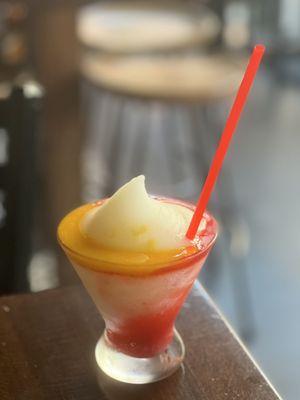 Passionfruit/Strawberry frozen margarita.