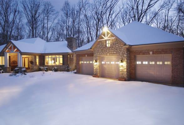 Weather resistant garage doors and springs