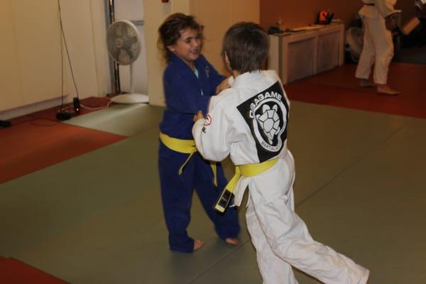 Kids Judo stand up training.