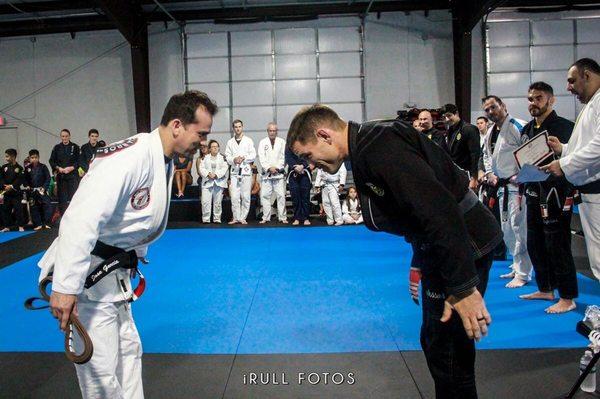 After years of dedicated training, professor Travis promotes Jose Garcia to the rank of Black Belt!