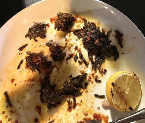 Just a few of the hard clumps in an otherwise mushy squid ink pasta.