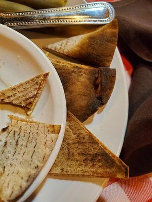 The chips (?) for the spinach artichoke dip were black and inedible.