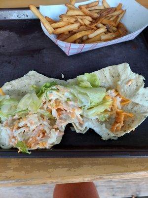 This was the buffalo chicken wrap. The cook was condescending and rude when we asked where the chicken was.