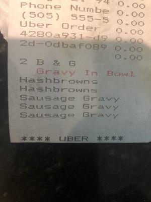 Receipt showing the original order for biscuit and gravy, two hashbrowns and three extra gravy servings that didn't come.