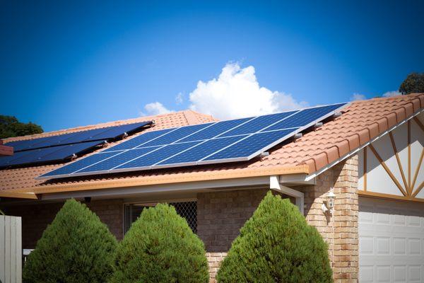 7 Kilo watt solar panel install over clay tile roof to to completely eliminate a single family home electric bill.