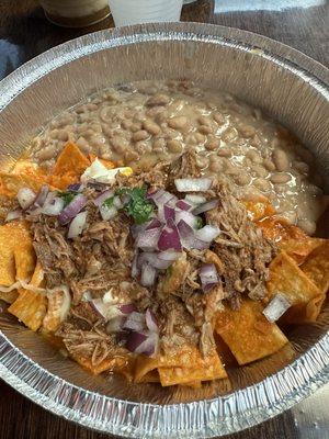 Loaded chilaquiles with birria