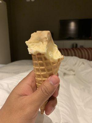 Vanilla and dulce de leche blue bell ice cream on a cone. Delicious