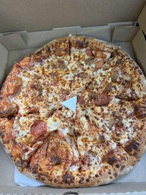 Large pepperoni and sausage pizza