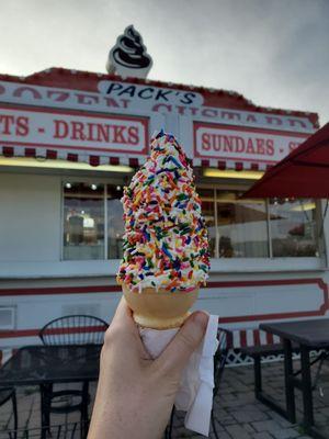 Medi vanilla cone with rainbow sprinkles