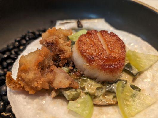 Maine diver scallop, roasted poblanos, cream, pickled tomatillo, pumpkin seeds, fried scallop frill