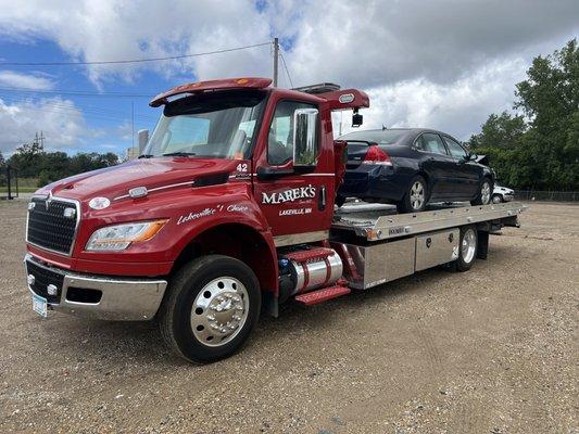 Flat bed towing