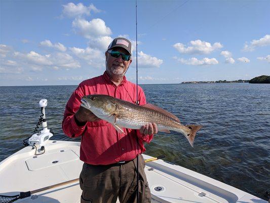 Brian was all smiles after landing this big redfish