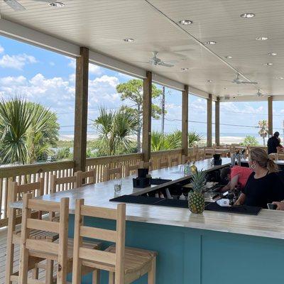 Covered outdoor patio with gorgeous views of the gulf and the Mississippi Sound!