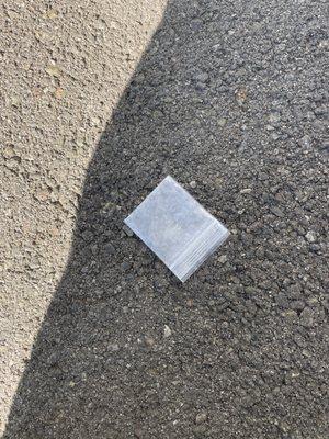 dope baggie in parking lot