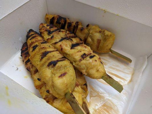 Pineapple Thai Cuisine - chicken satay to go ($8.95 for 3 large pieces) (partially consumed) 2/2023