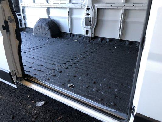 Dodge, van sprayed bullet liner on the floor. Bullet liner is slip and water resistant, ensuring safety for our customer and this vans floor