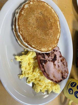 Eggs Lakeway with ham and blueberry pancakes