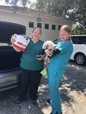 At the end of the visit the staff brought out special food, a portable debit card swiper and a relaxed dog!