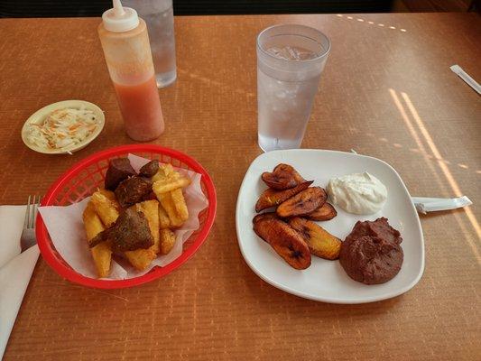 Fried pork and yuca. Fried plantains, black beans, sour cream.