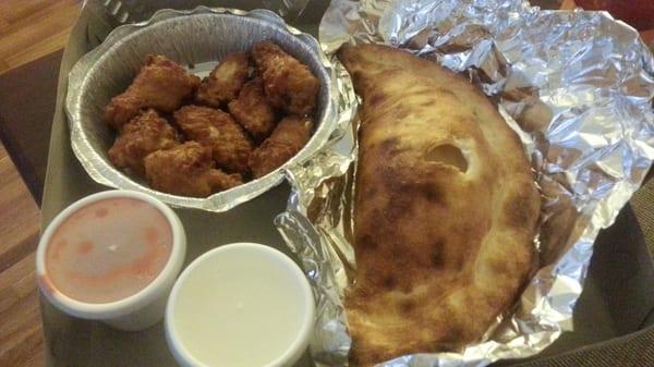 Wings (8! - that's a lot) and a cheese calzone (HUGE)