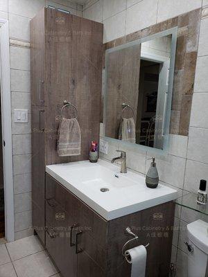 Custom made vanity with bathroom pantry and LED touch mirror