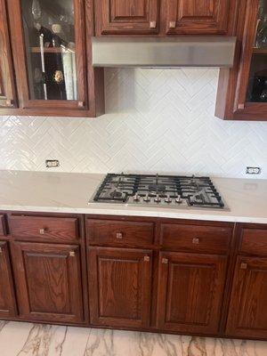 This is my kitchen area. David and Eric replaced the backsplash. Wall plates had not been replaced yet.