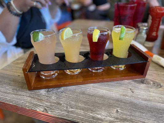 Mimosa flight! Guava mint, peach bellini, blueberry pom and mango habanero