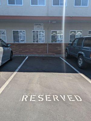 Parking says reserved- it is for customers and tenants at the building. Never had a problem finding parking.