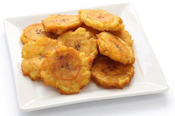 Tostones/ green fried plantains