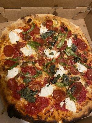 One is the NY style coal fired with long hots .. pepperoni.. sausage.. and ricotta cheese.