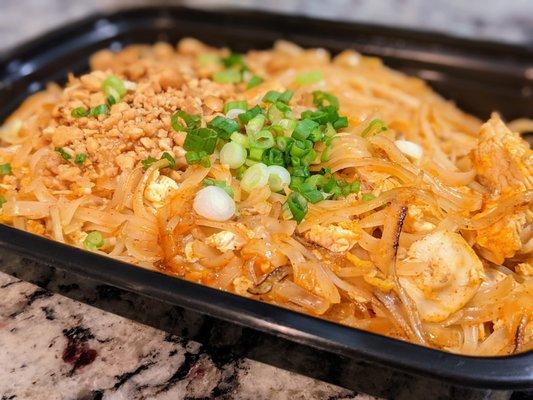 Pad Thai with chicken. $11. Sauteed rice stick noodles, egg, bean sprouts, scallions, and ground peanuts with Thai seasoning.