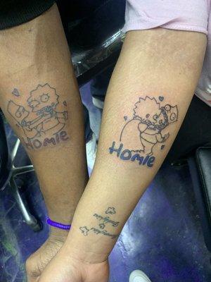 Matching Simpsons themed BFF tattoos