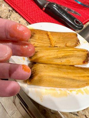 Beef tamales. Greasy, not very tasty (to me) and small.