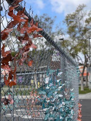 The parking entrance full of metal colorful butterflies