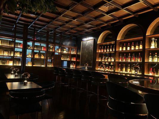 Bar area behind the bookcase