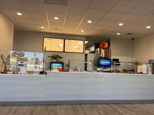 Nice clean and spacious counter and steam tables for some items.