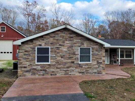 Stone siding windows roofing project