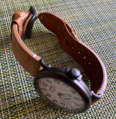 Leather band split from everyday moisture.