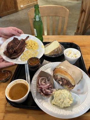 Bbq/turkey sandwich and three meat plate