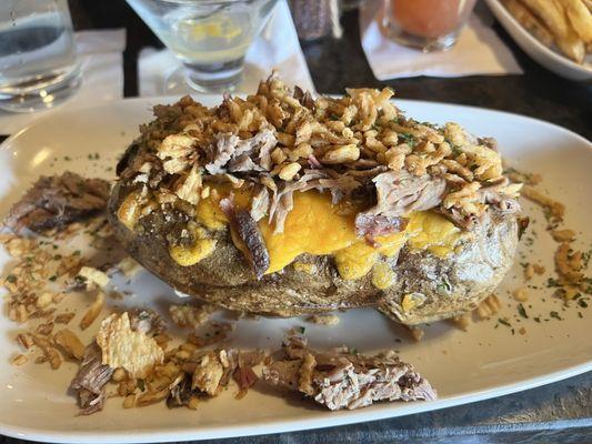 Baked potato with pulled pork.