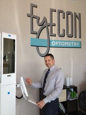 Dr. Godines and their Visioffice machine (to precisely measure every detail of the frame in order to produce customized lenses.)