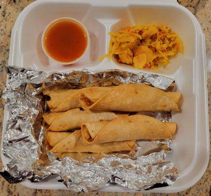 Taco Dorados with marinated cabbage and red salsa