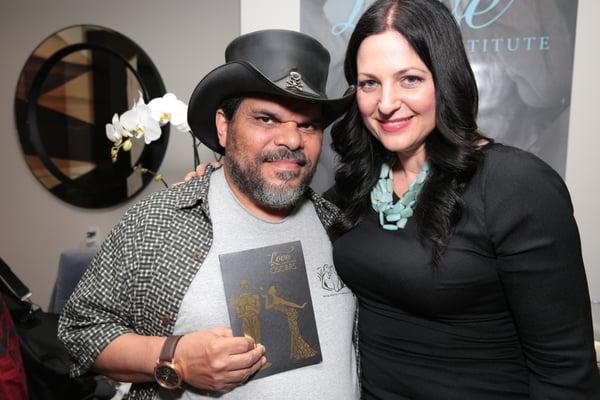 Actor Luis Guzman and Meagan Holub, Celebrity Massage Therapist and Founder of The Love Institute at the Oscars Gift Suite.