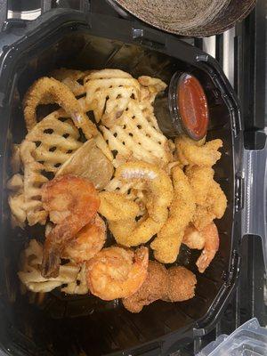 Louisiana Platter that I paid $30 for 4 small bite size catfish bites and about 4 Shrimps.   And a small bowl of Red Beans and rice.