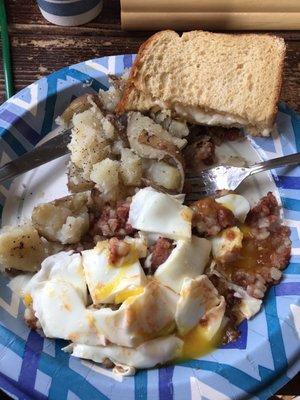 Corned beef hash with eggs and 1 wheat toast