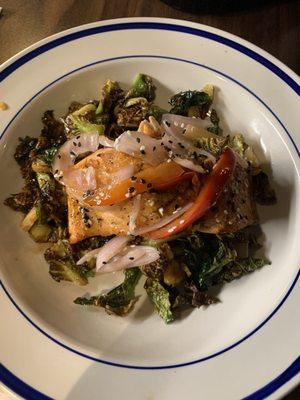 Teriyaki Salmon on a bed of crispy Brussels sprouts.