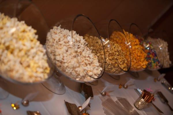 Guests made their own bags of popcorn for wedding favors