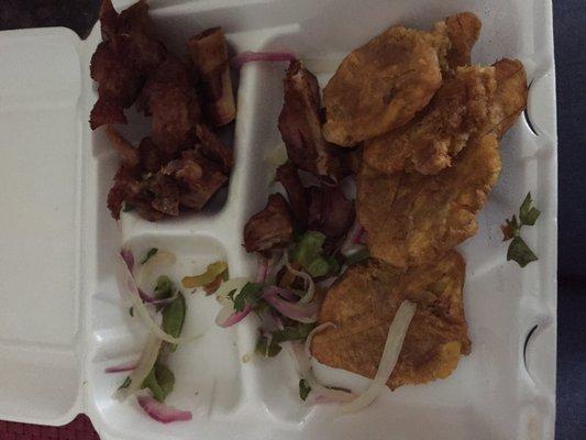 $10 platter of fried turkey (Tasso den) and plantains (banan peze). The plate is empty.