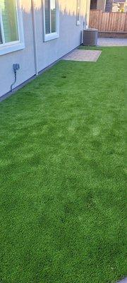 Artificial Turf and electric outlet.