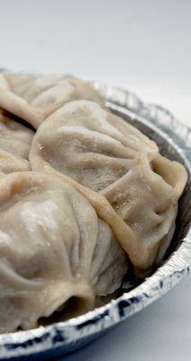 Steamed Beef Momo: $10 ($10.89 with tax) for 8. Take-out.